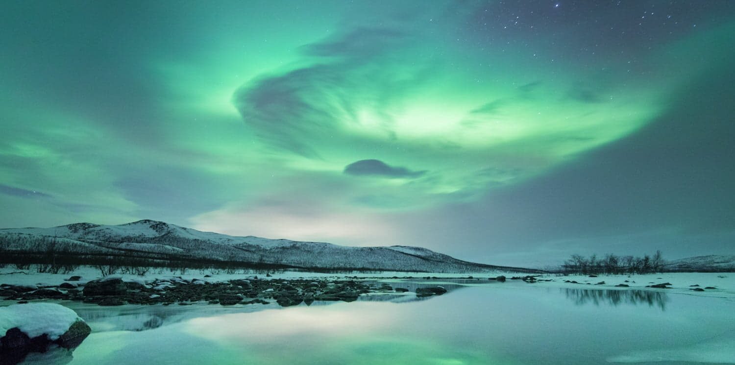 An Arctic Escape beneath the Aurora