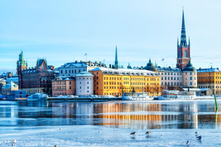 A view of Stockholm's gamla stan region from across the frozen river in winter time.